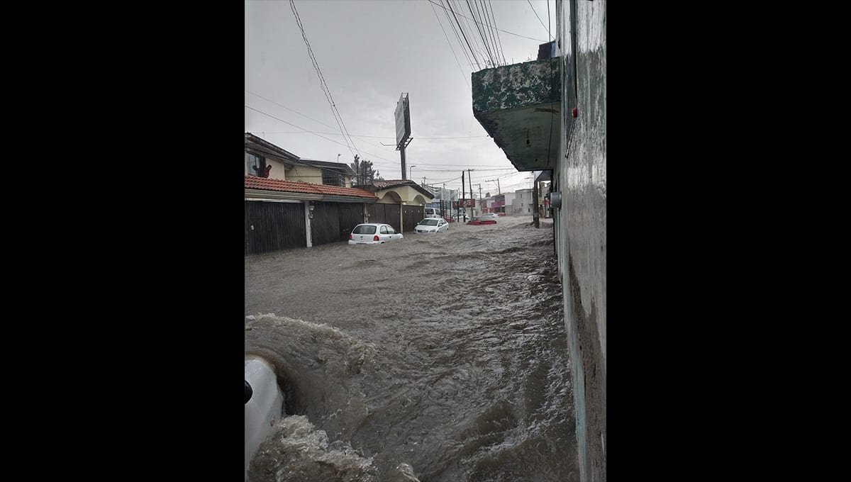 VIDEOS/FOTOS: Se registran encharcamientos en el sur de Puebla por la intensa lluvia 1 inundaciones en Puebla tras fuerte lluvia