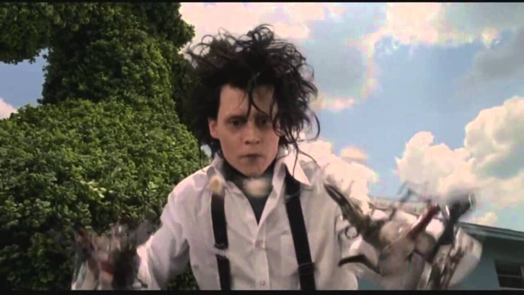 joven manos de tijera