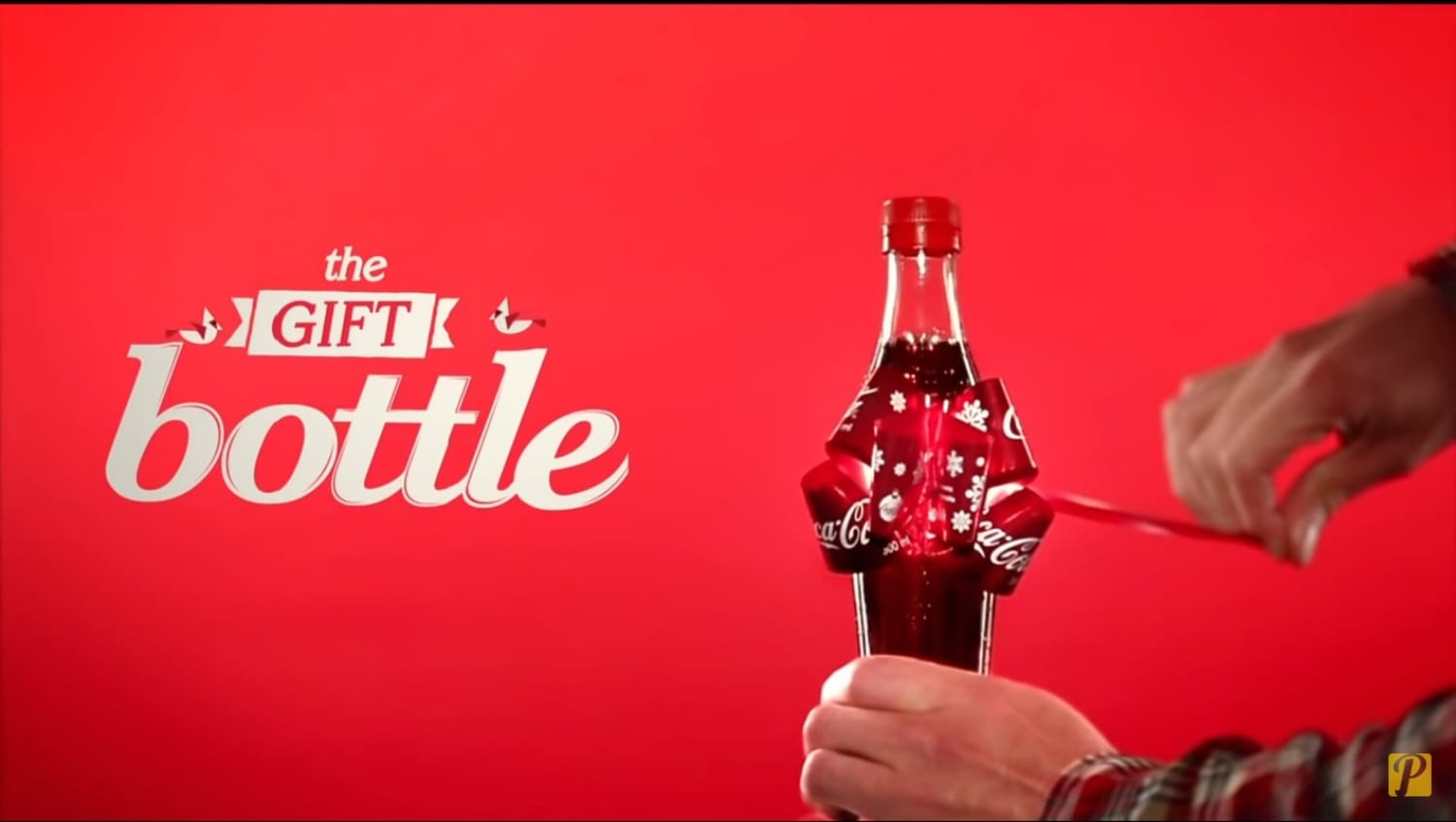 Etiqueta de Coca Cola se convierte en moño navideño 1 MONO COCA COLA