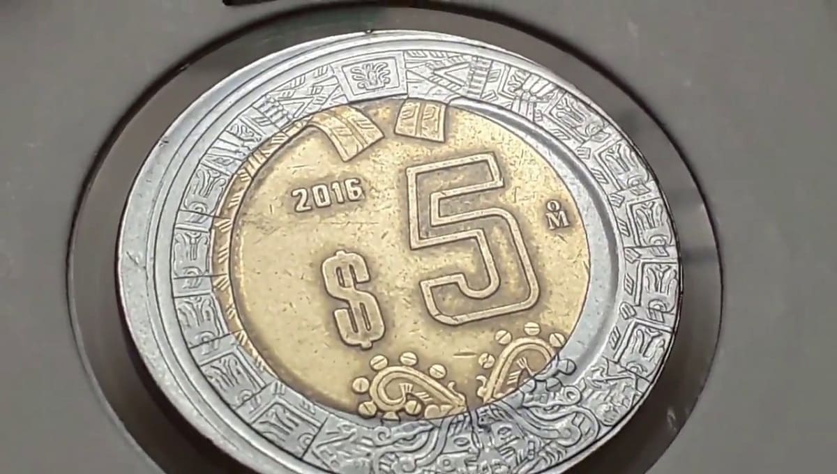 Moneda. 1