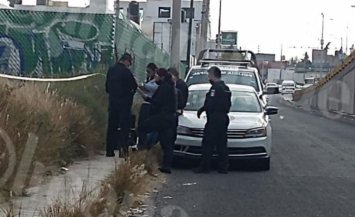 Hallan cuerpo sin vida colgado de una malla ciclónica en el Periférico Ecológico 1 periferico 1
