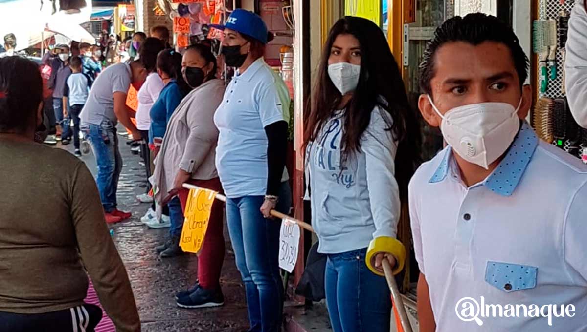Locatarios del Mercado Amalucan forman valla humana para defenderlo de Claudia Rivera 3 amalucan comerciantes1