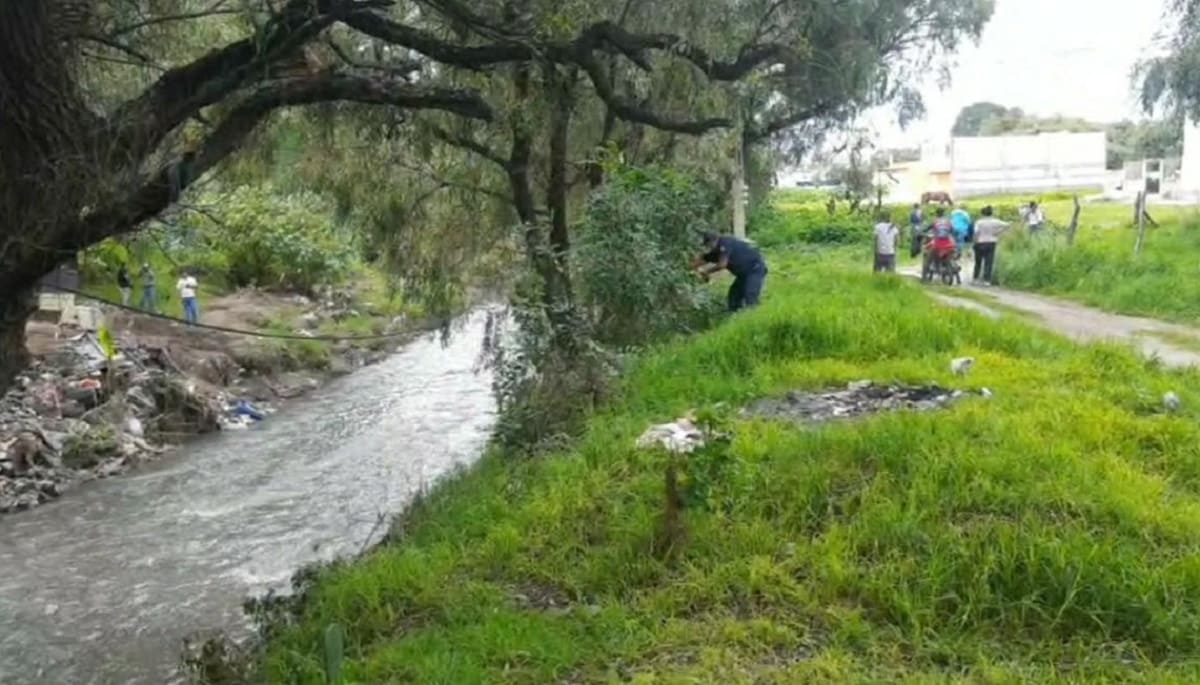 Cadáver de un hombre es hallado flotando en el río Atoyac en Texmelucan 3 cadaver rio Atoyac. 1