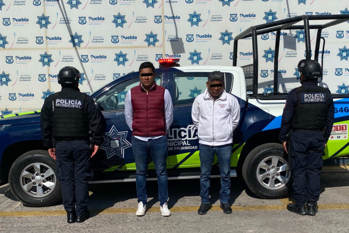 Policía municipal de Puebla detuvo a dos sujetos por robo a institución financiera 1 robo a institucion bancaria 1