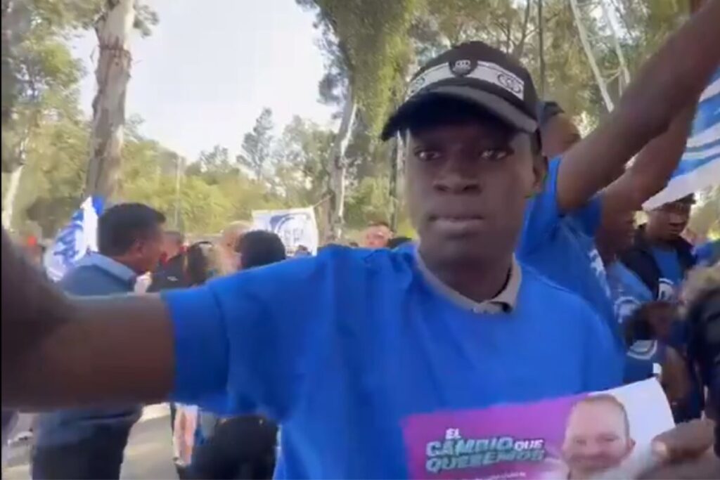 haitianos acarreados a evento de Santiago Taboada