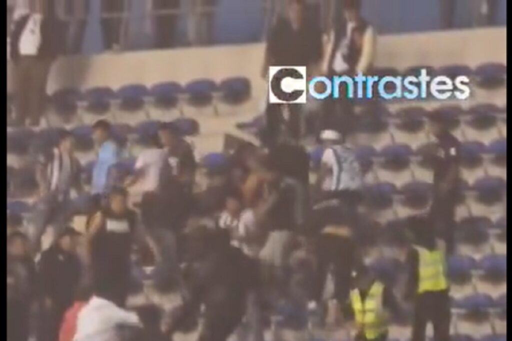 aficionados del puebla y los tuzos pelean en el cuauhtémoc