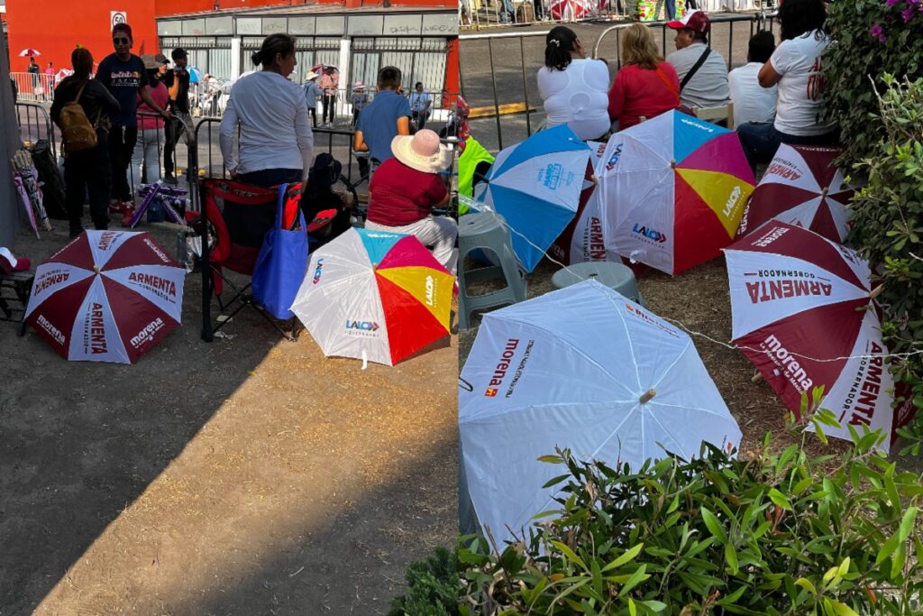 Guerra de sombrillas en el desfile de la Batalla de Puebla