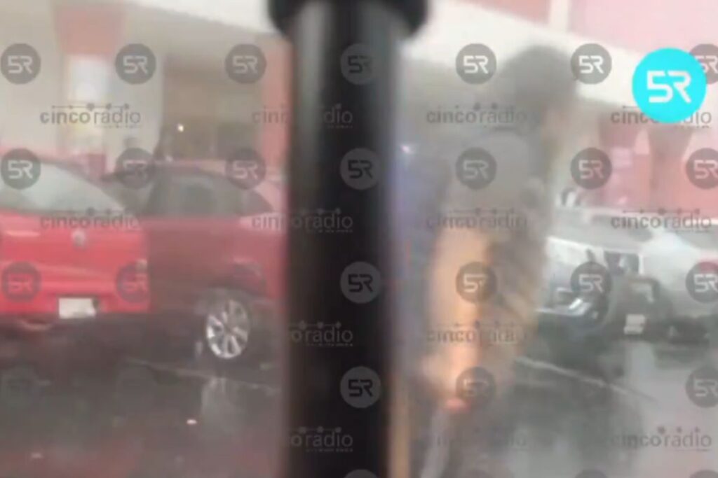 pelea en estacionamiento de Puebla