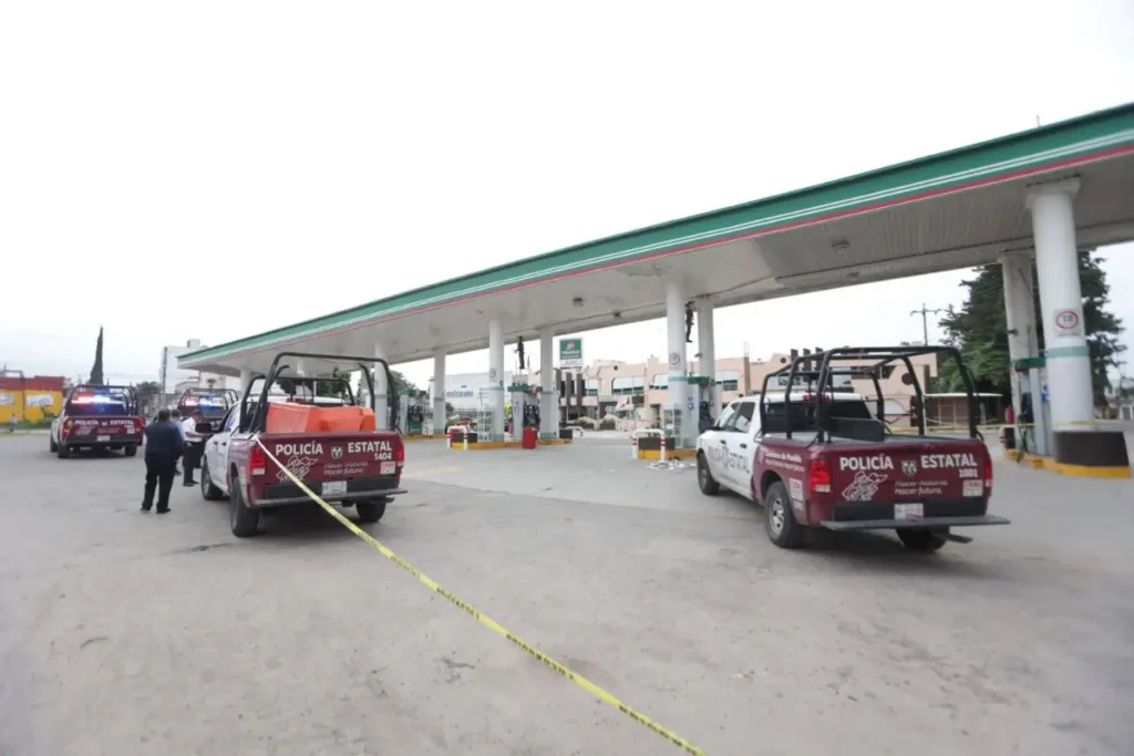 Ejecutaron a padre e hijo en gasolinera de Tepeojuma