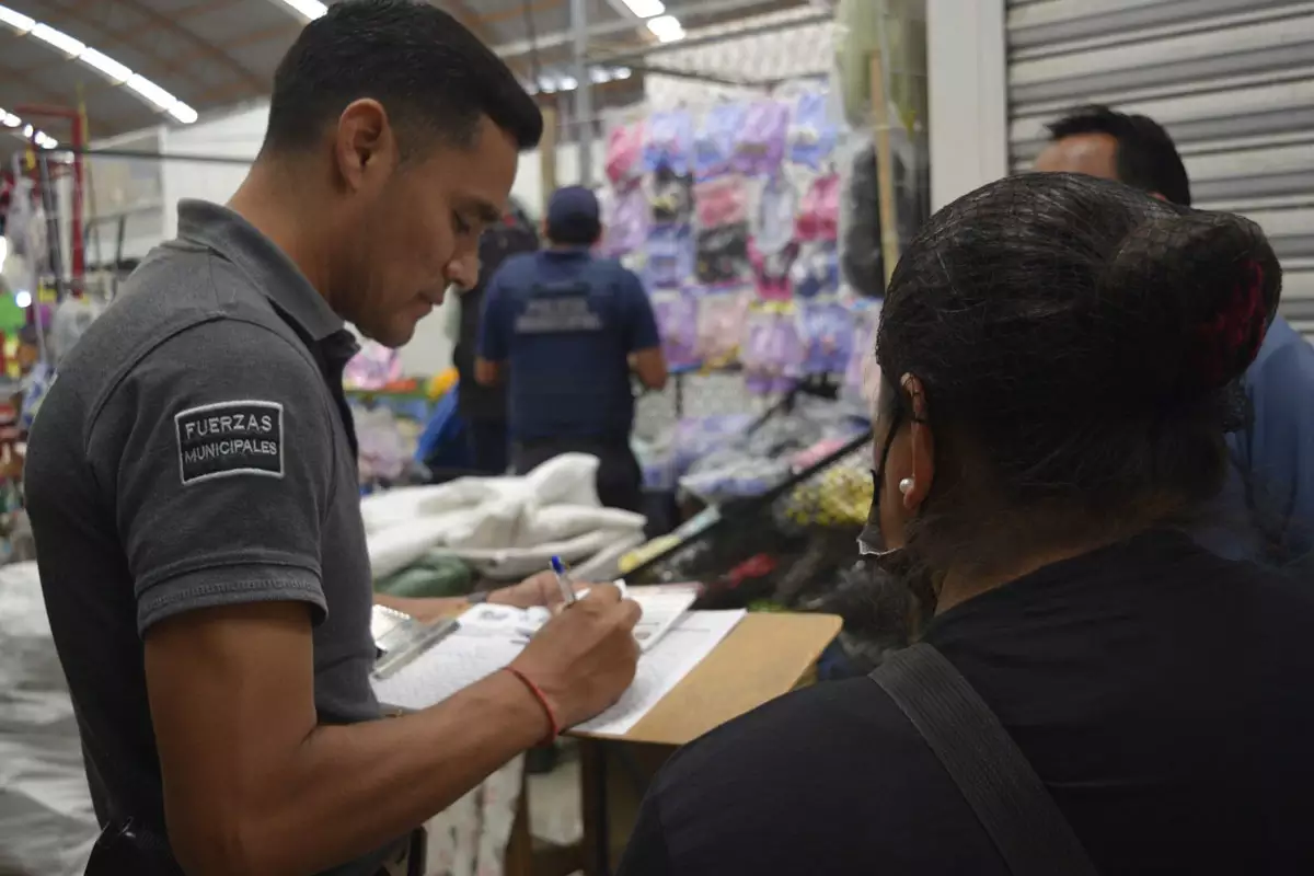 Policia de San Pedro Cholula suma a mas comerciantes al comite de seguridad del Tianguis de Xixitla 4