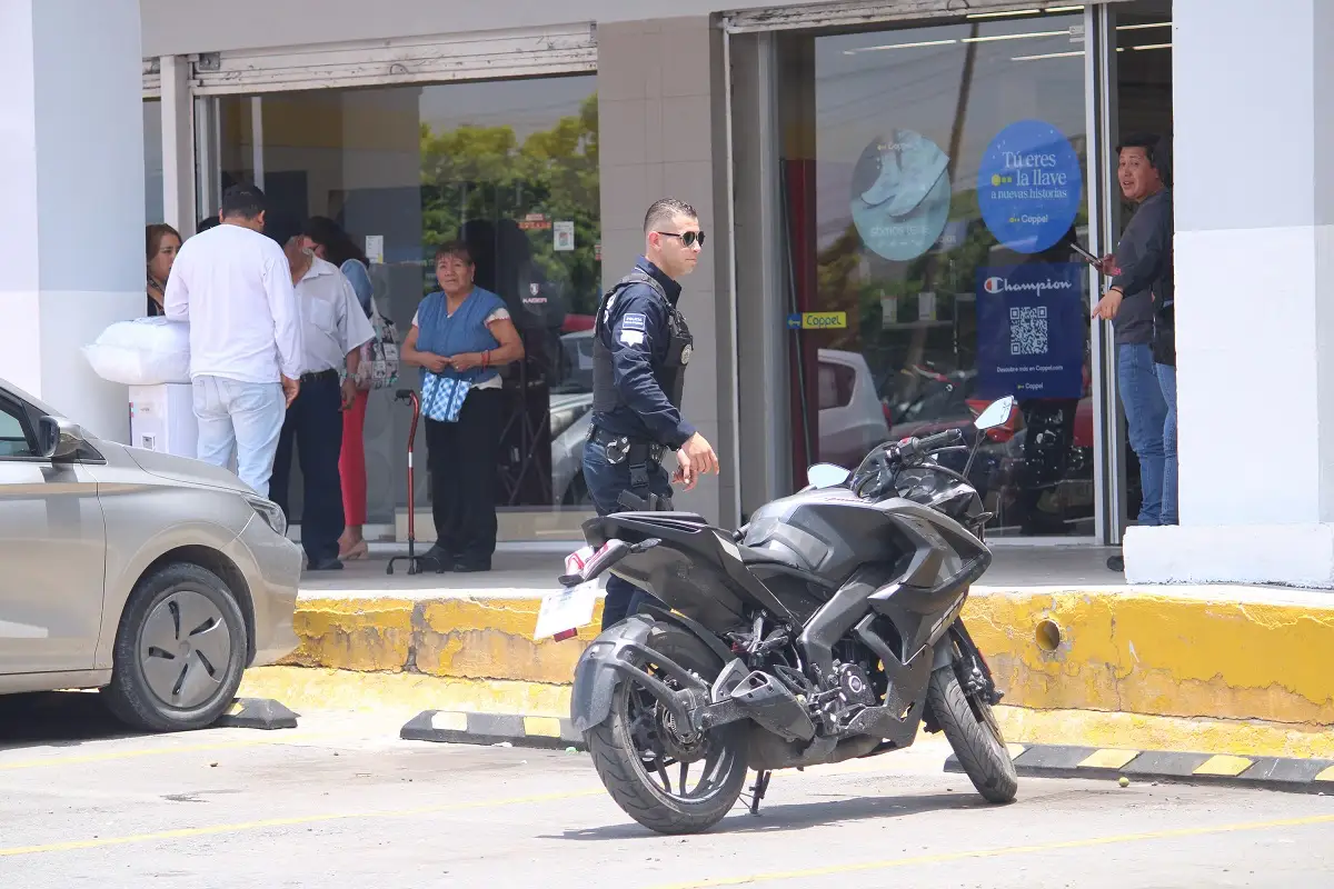 Asalto a Coppel de la 11 Sur