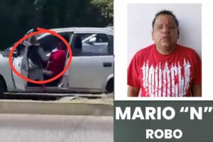 mujer se cuelga de un auto para impedir robo en Puebla y detienen al asaltante